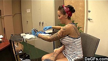 Tattoo Artist gets good care of her client