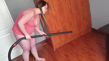 Busty fat slut masturbating with the vacuum cleaner