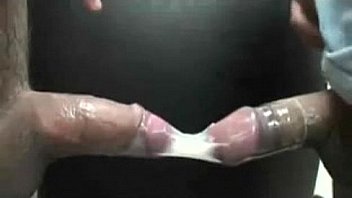Double cum mixture inside condom - Dois cacetes em uma so camisinha